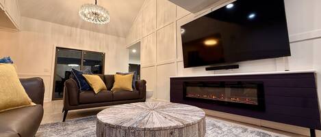 Smart TV, fireplace, table football, stereo