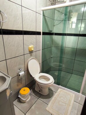 Shower, towels, soap, toilet paper