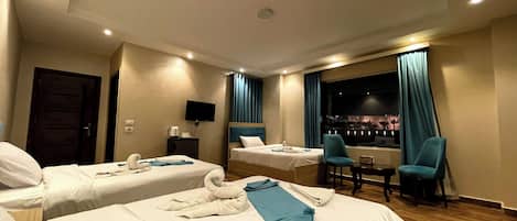 Deluxe Triple Room With Grand Egyptian Museum View | Premium bedding, minibar, desk, soundproofing