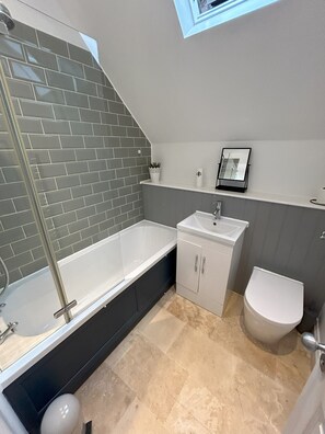 Eco-friendly toiletries, hair dryer, towels, soap
