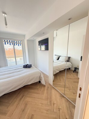 1 غرفة نوم ومكواة/لوح كي وواي فاي وملاءات أسرّة