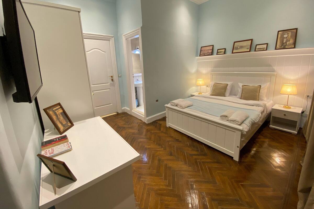 Classic Studio, 1 Queen Bed, City View | Desk, laptop workspace, free WiFi, bed sheets