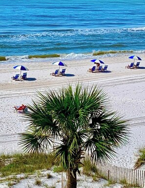 On the beach, sun-loungers