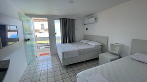 Comfort Triple Room, Private Bathroom, Beachfront | Laptop workspace, blackout drapes, iron/ironing board, free WiFi