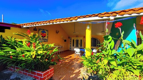 Deluxe villa for 25 people, 3 bedrooms, 2 bathrooms, living room and terrace.