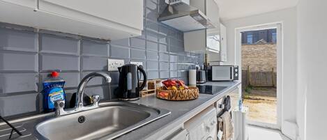 Microwave, oven, stovetop, coffee/tea maker