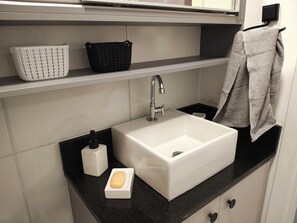 Shower, towels, toilet paper