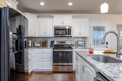 Abilene's Ultimate Backyard Getaway: Putt-Putt, Fire Pits, & Giant Games Galore!