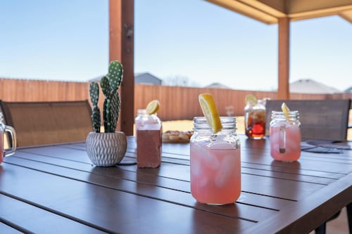 Abilene's Ultimate Backyard Getaway: Putt-Putt, Fire Pits, & Giant Games Galore!