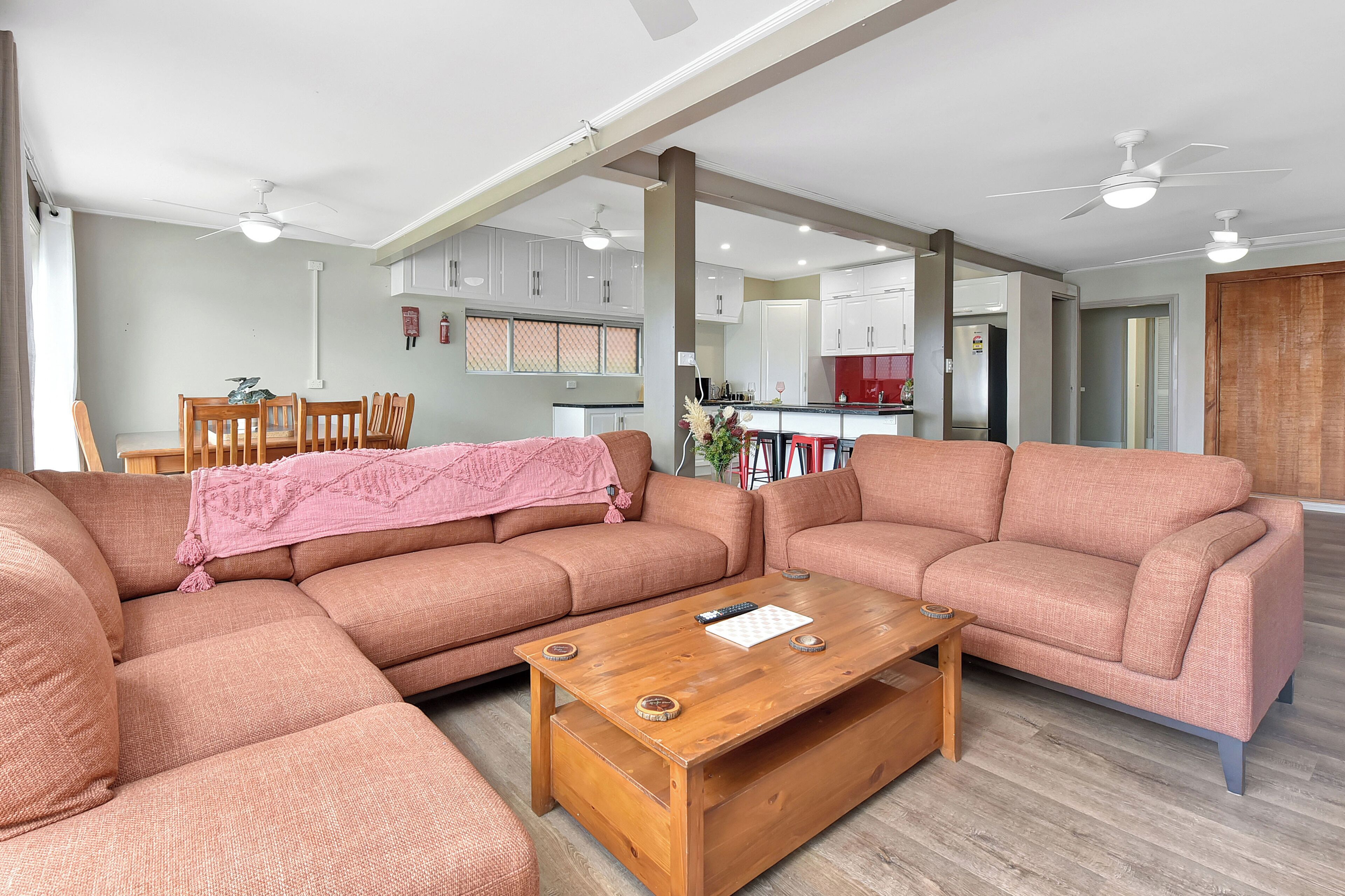 Economy Apartment, Garden View | Living room | Flat-screen TV