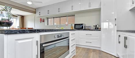 Economy Apartment, Garden View | Private kitchen | Electric kettle, toaster