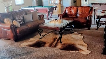 Smart TV, fireplace, foosball, books