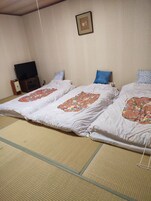 Triple Room, Garden View | Desk, laptop workspace, free WiFi