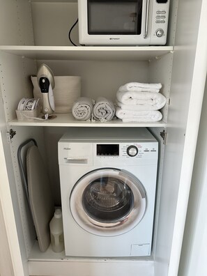 Convenient laundry facilities include a washer and dryer.