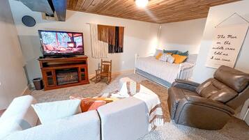 Smart TV, fireplace, table tennis, books