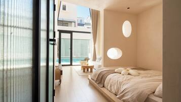 Signature Studio Suite, Multiple Beds, Pool Access, Pool View | Pillowtop beds, blackout drapes, soundproofing, iron/ironing board