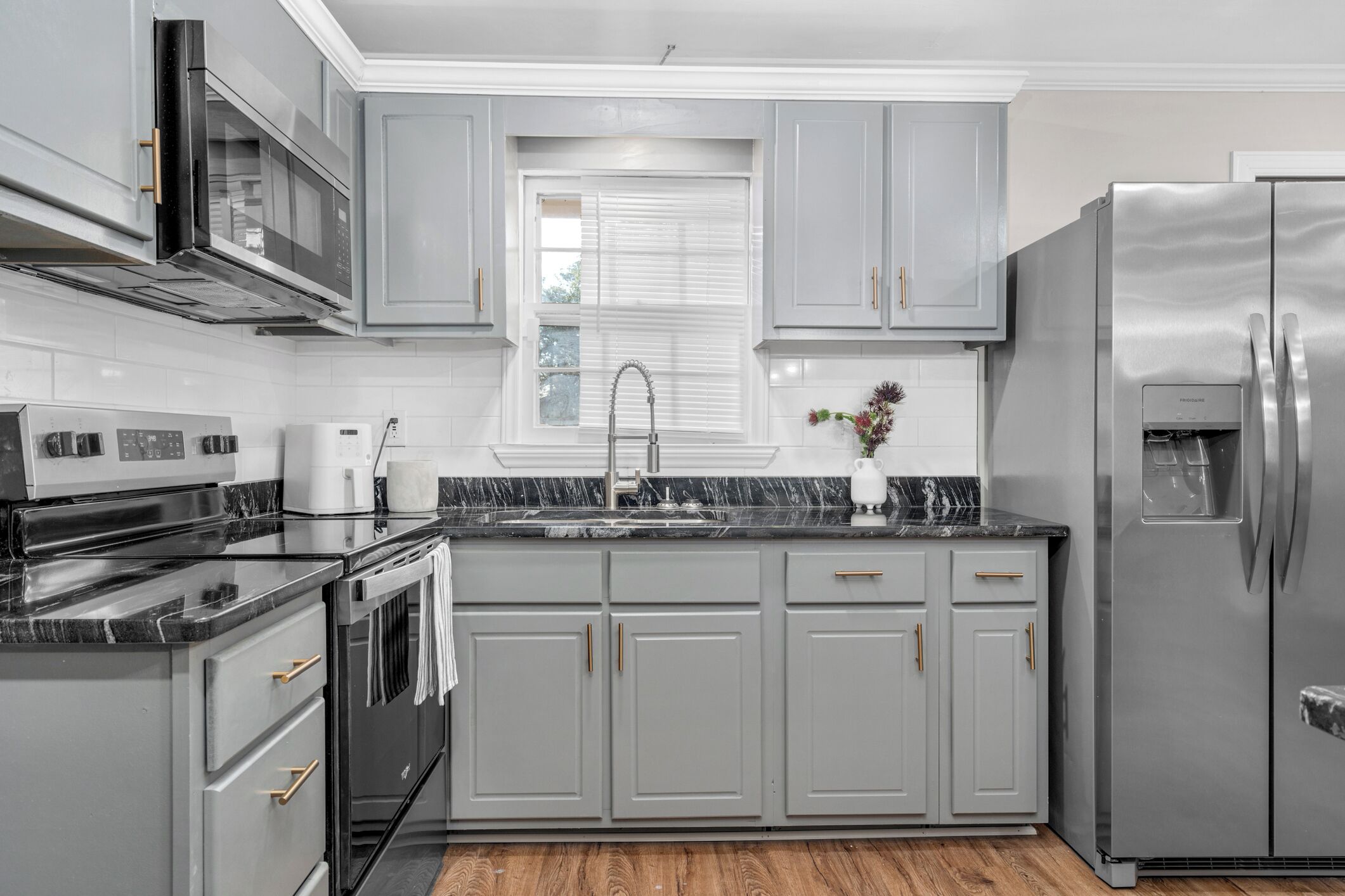 Dishwasher, electric kettle, cookware/dishes/utensils, dining tables