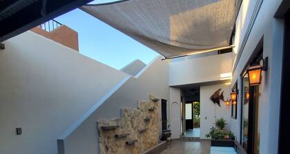 Pristine 3-bed, 3.5-bath villa with mountain, golf course, sea views & hot tub