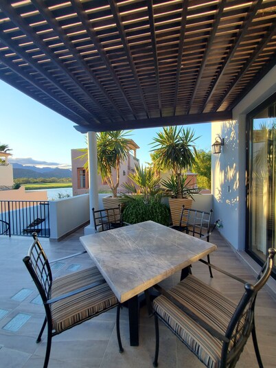 Pristine 3-bed, 3.5-bath villa with mountain, golf course, sea views & hot tub 
