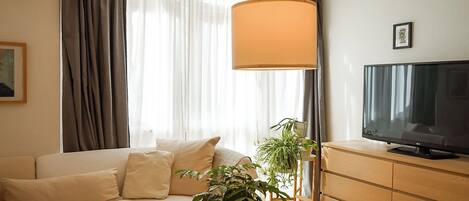 Apartamento Deluxe | Sala de estar