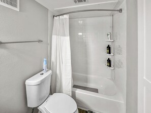 Hair dryer, towels, soap, toilet paper