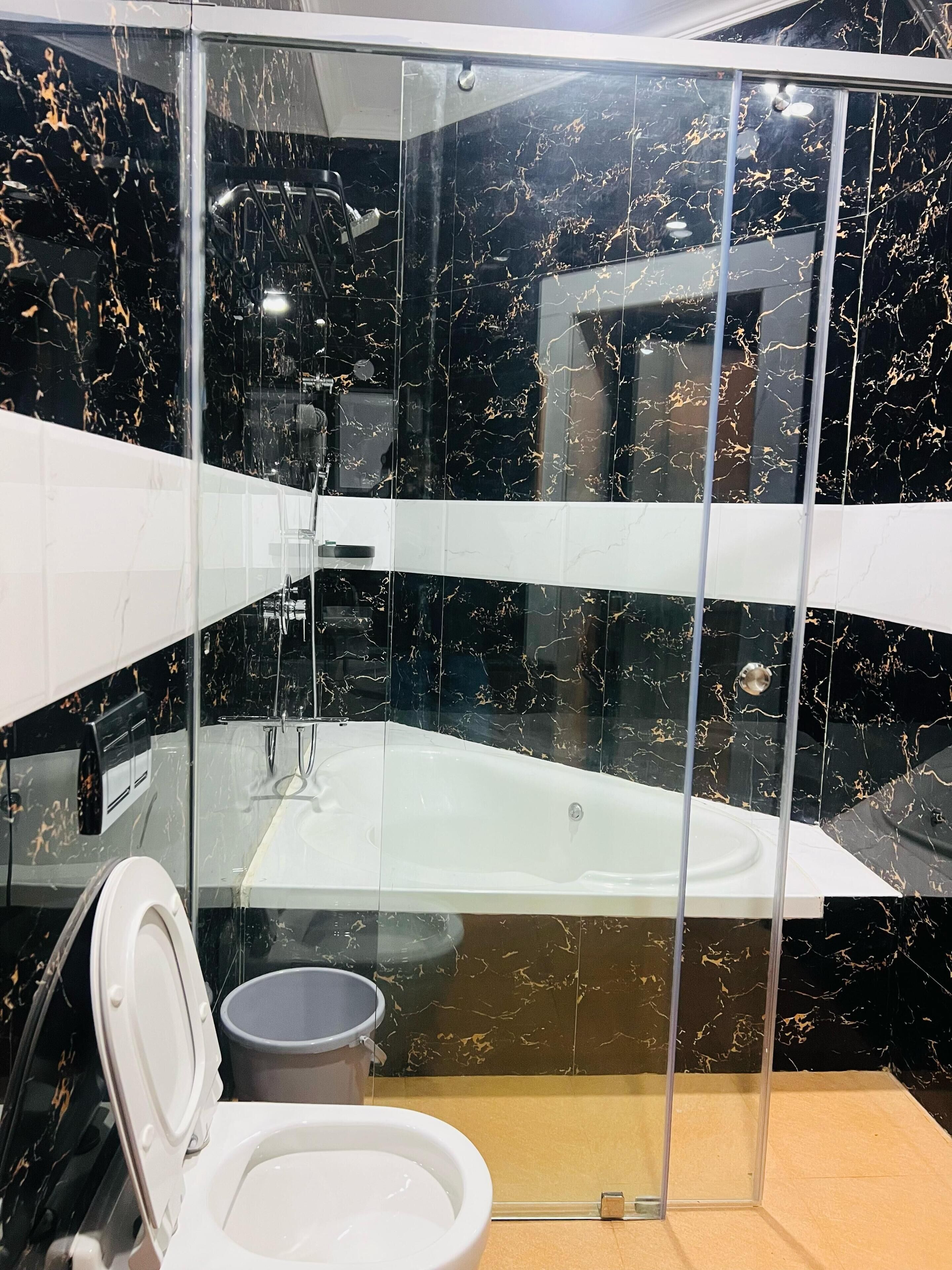 Luxury Suite, Pool View | Bathroom | Shower, soap