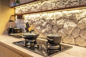 Fridge, microwave, stovetop, coffee/tea maker