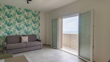 Design Studio, Balcony, Valley View | Living area | TV