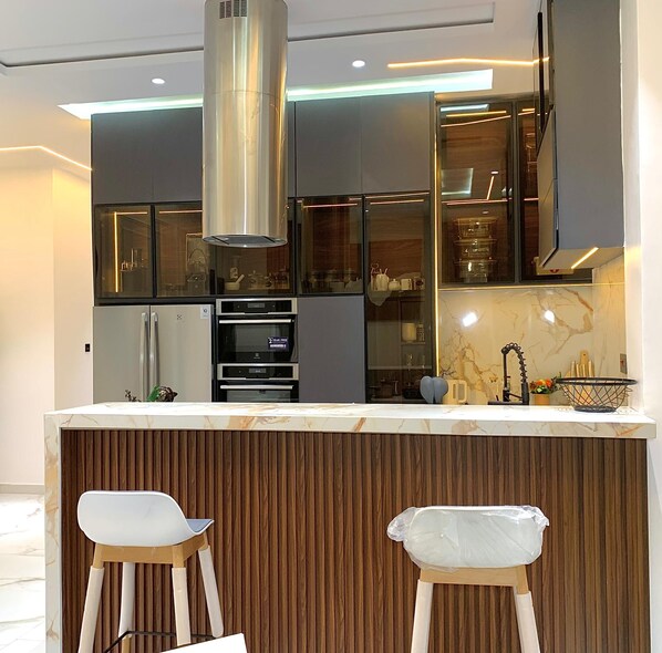 Luxury Apartment, 2 Bedrooms, Kitchen, Executive Level | Private kitchen | Full-size fridge, microwave, oven, stovetop - Second Home (Lekki)