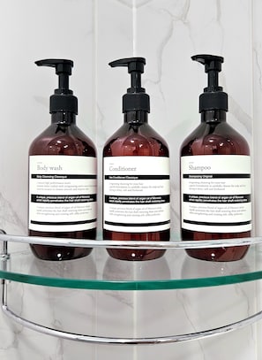 Shower, hair dryer, towels, soap