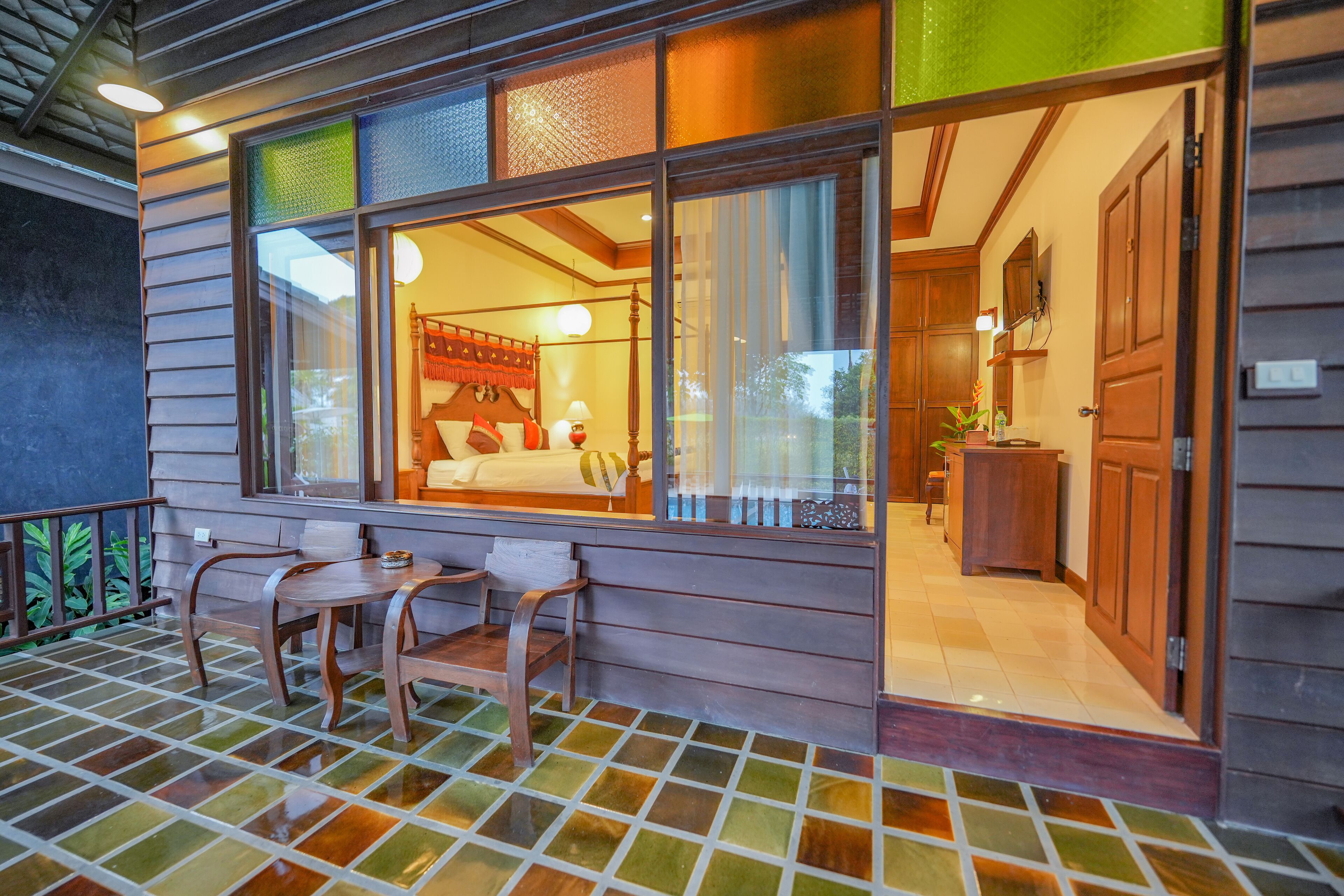 Deluxe Villa, Pool View | Living area | 24-inch Smart TV with cable channels