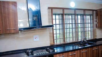 Family Apartment, Balcony, City View | Private kitchen | Fridge