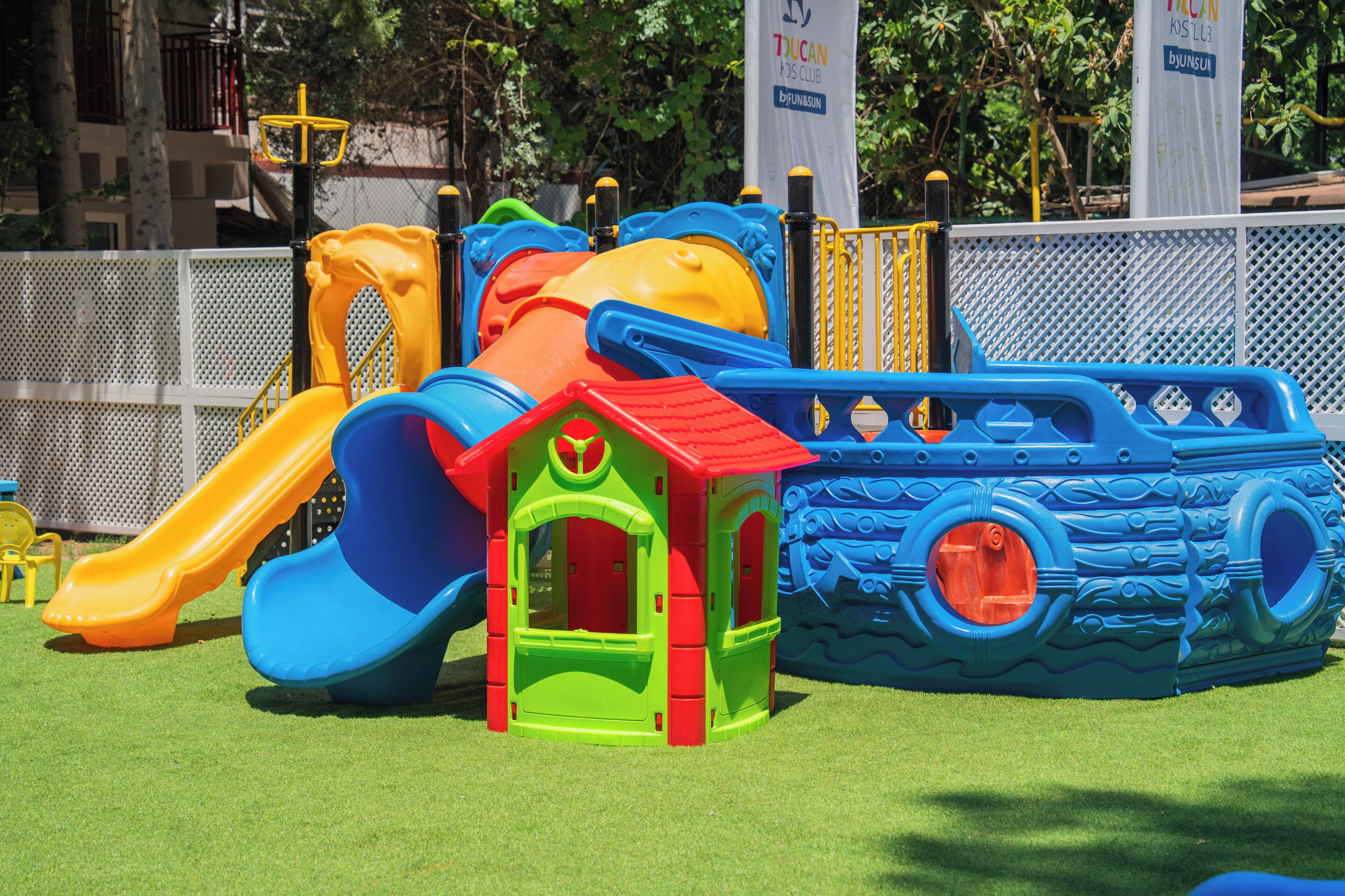 A playground with slides and climbing structures.