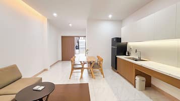 Căn hộ Deluxe, 1 phòng ngủ, quang cảnh thành phố | Khu phòng khách | TV