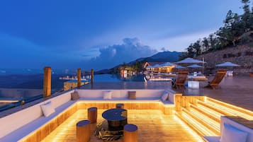 Outdoor pool, open 9:00 AM to 9:30 PM, pool umbrellas, pool loungers