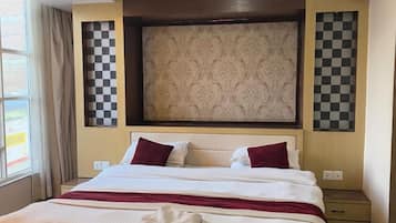 Deluxe Double Room, City View | Desk, laptop workspace, free WiFi