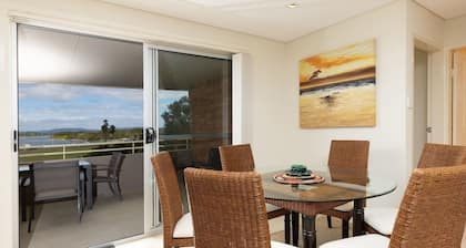 Tuncurry Tides overlooking the lake.