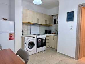 Apartment | Private kitchen | Fridge, oven, stovetop, coffee/tea maker - Cozy Apartment in Agios Loukas (Athens)