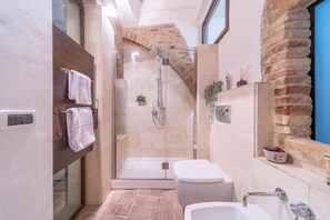 Shower, eco-friendly toiletries, hair dryer, bidet