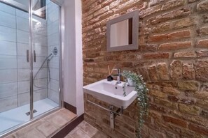 Shower, eco-friendly toiletries, hair dryer, bidet