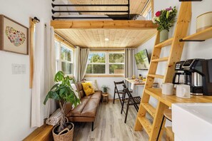TV, offices - Nook at the Springs | Tiny Home • Full Kitchen (Fort White)