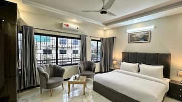 Quarto casal ou duplo luxo, vista para o jardim | Wi-Fi de cortesia