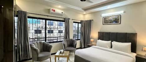 Habitación Deluxe con 1 cama matrimonial o 2 individuales, vista al jardín | Wifi gratis