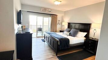 1 bedroom, desk, iron/ironing board, travel crib