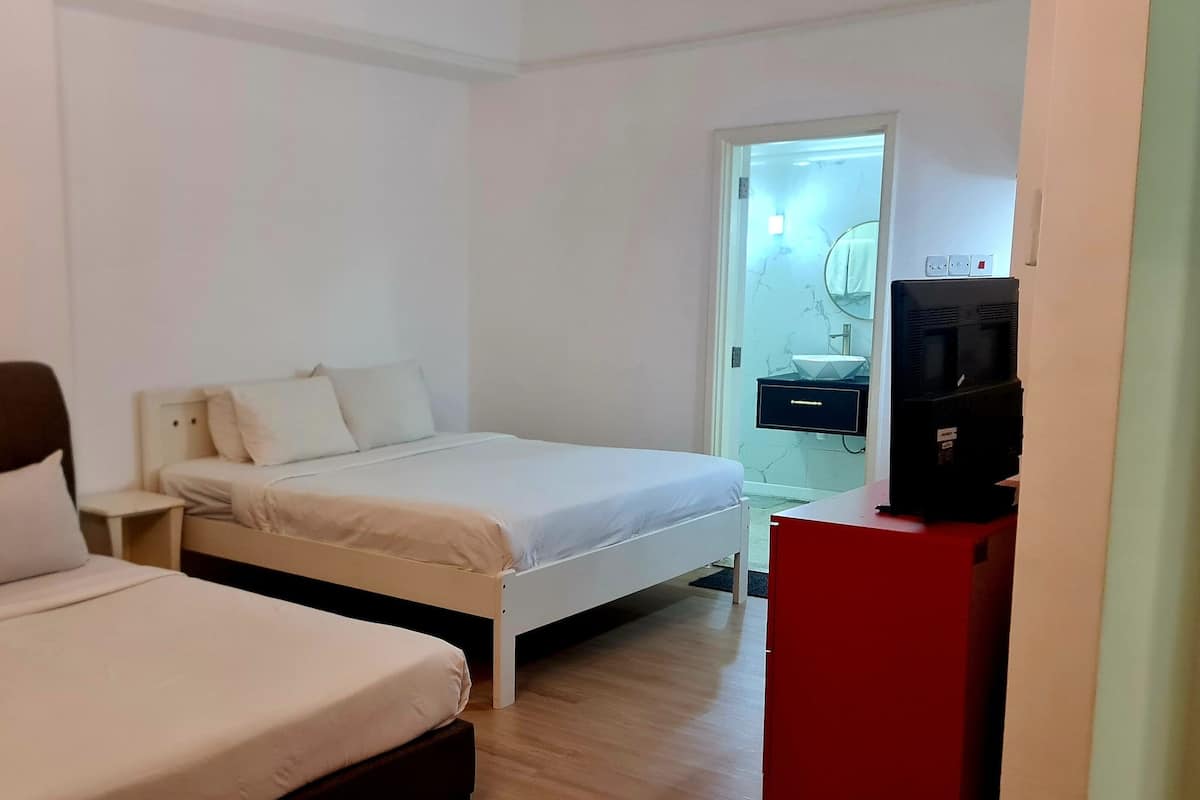 Habitación junior con 2 camas individuales | Sábanas de algodón egipcio y ropa de cama de alta calidad