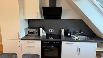 Apartamento superior | Servicio de comidas en la habitación