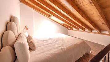 2 slaapkamers, een strijkplank/strijkijzer, internet, beddengoed