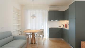 Apartment | Living area | 100-cm LED TV with digital channels