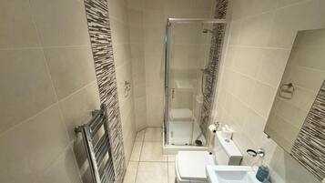 Hair dryer, towels, soap, toilet paper