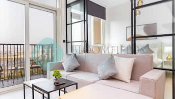 Deluxe Apartment, Balcony, City View | Living area